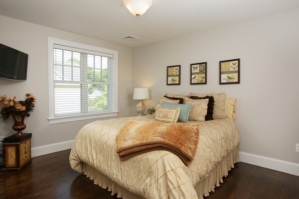 25 Patton Road Wellesley, MA 02482 - Photo 15 of 20 a bedroom with a bed and a flat screen tv