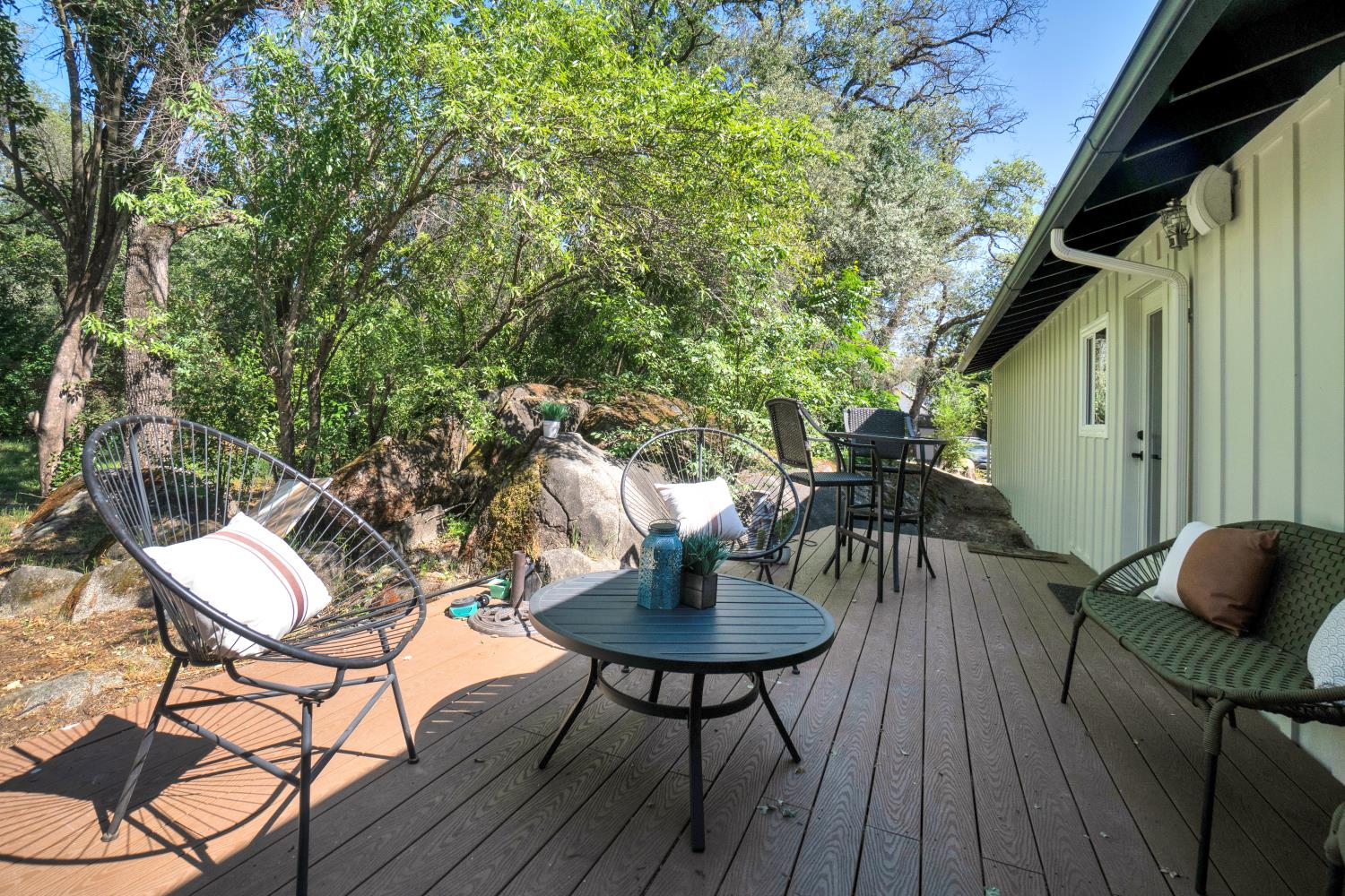 6299 Horseshoe Bar Road Loomis, CA 95650 - Photo 25 of 43 a backyard of a house with table and chairs