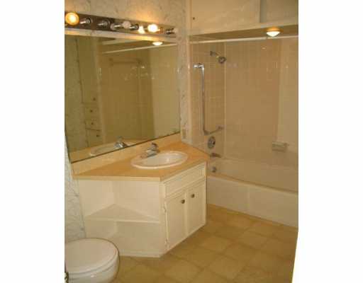 3335 Floyd Street Corpus Christi, TX 78411 - Photo 7 of 8 a bathroom with a granite countertop sink toilet and shower