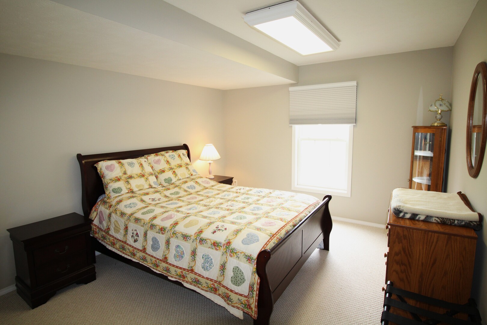 25 Oak Park Road Bloomington, IL 61701 - Photo 19 of 28 a bedroom with a bed and two windows