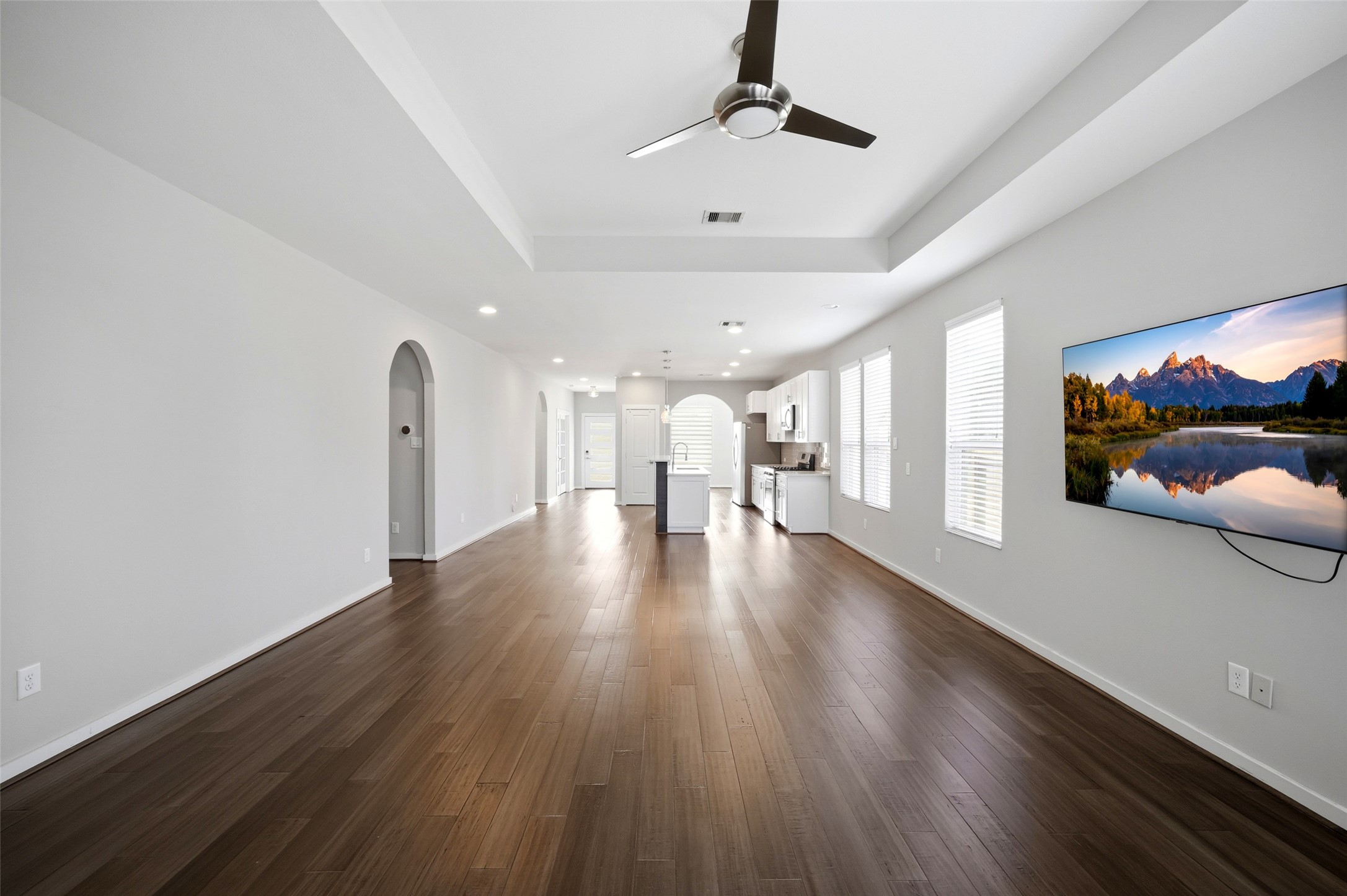 605 Dumble Street Houston, TX 77023 - Photo 17 of 44 a view of a hallway with wooden floor