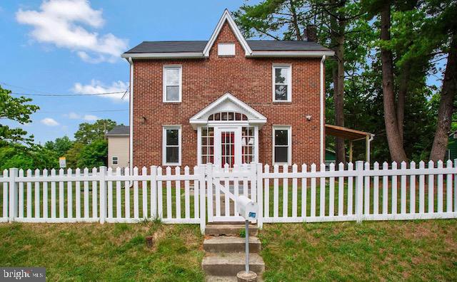 a front view of a house with a porch