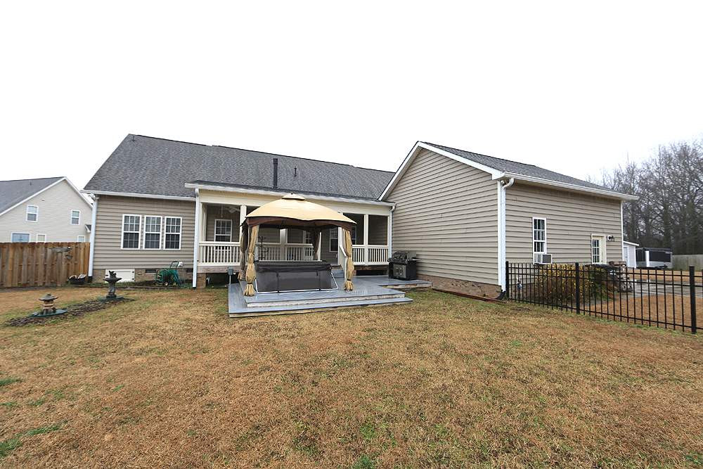 522 Open Grove Way Willow Spring, NC 27592 - Photo 24 of 25 Deck & Hot Tub