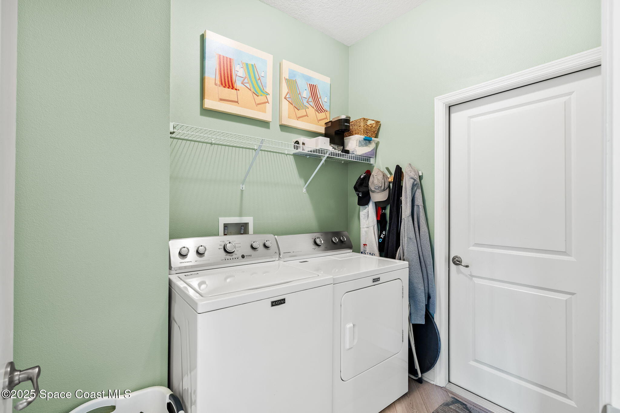 4310 Alamanda Key Drive Melbourne, FL 32901 - Photo 22 of 43 a utility room with dryer and washer