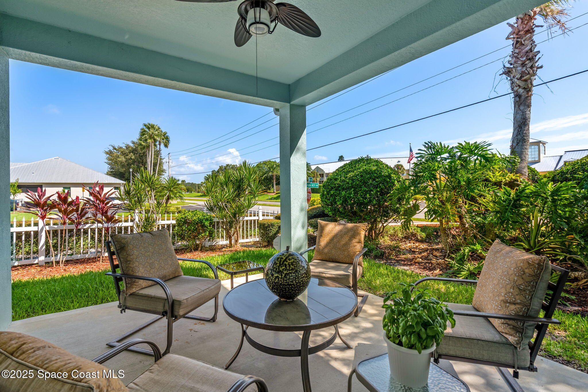 4310 Alamanda Key Drive Melbourne, FL 32901 - Photo 23 of 43 a view of a chairs and table in patio