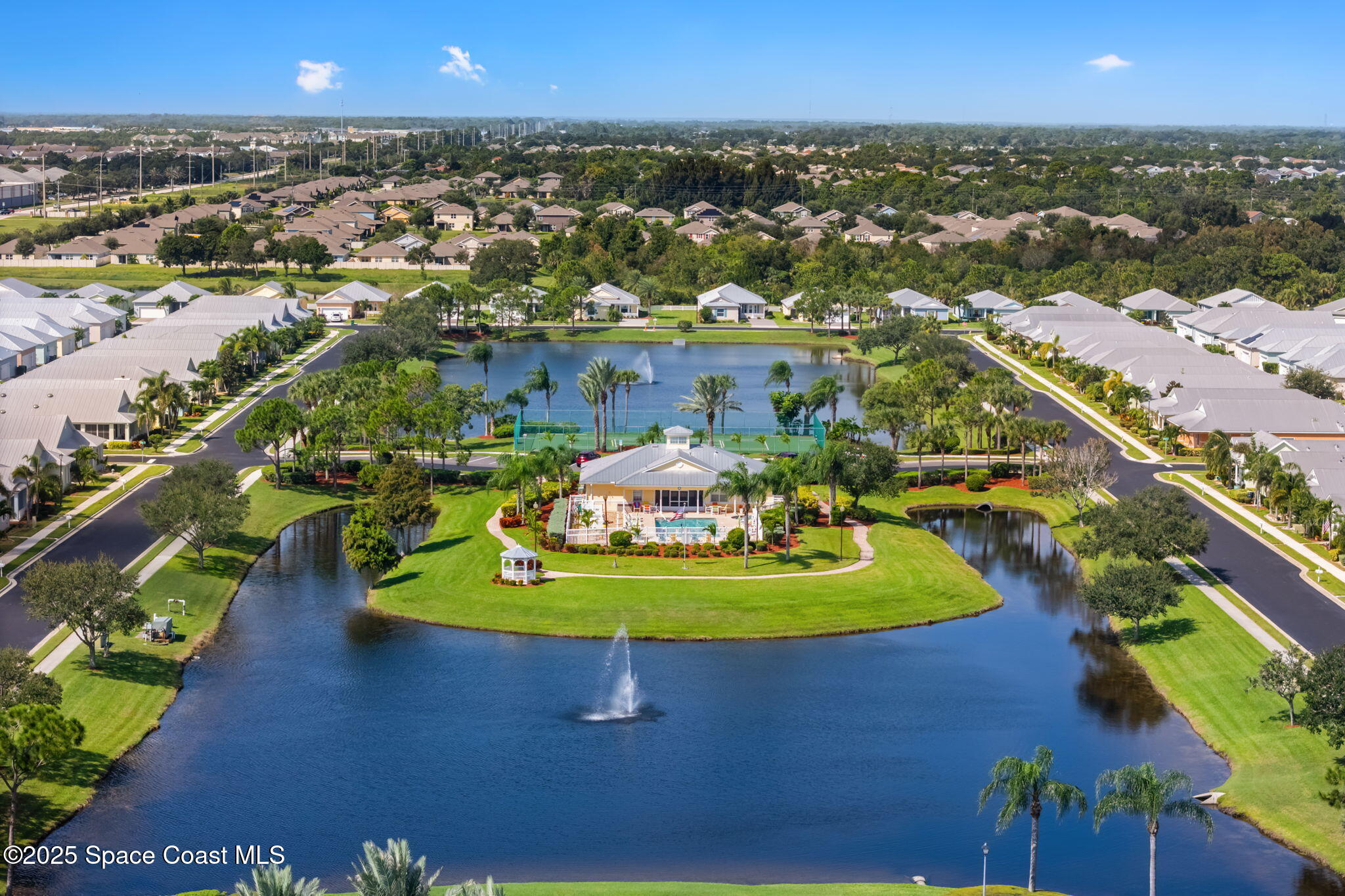 4310 Alamanda Key Drive Melbourne, FL 32901 - Photo 27 of 43 an aerial view of a house with a swimming pool yard and outdoor seating