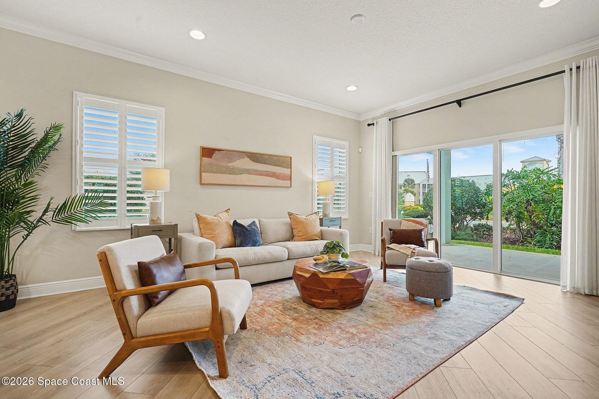 4310 Alamanda Key Drive Melbourne, FL 32901 - Photo 6 of 43 a living room with furniture and a large window