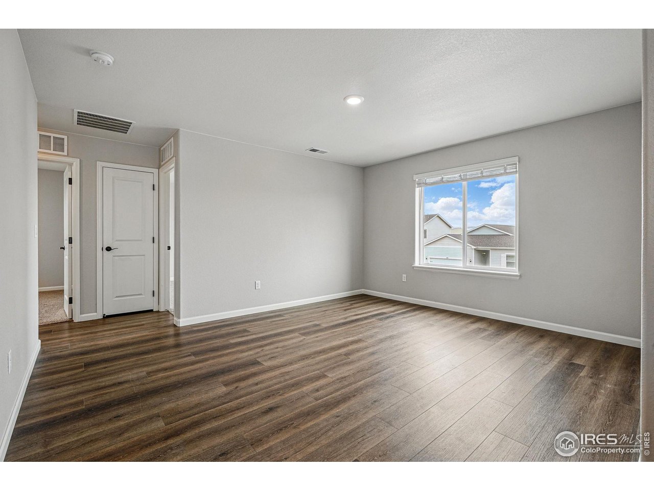 2310 Angus Street Mead, CO 80542 - Photo 18 of 39 wooden floor in an empty room