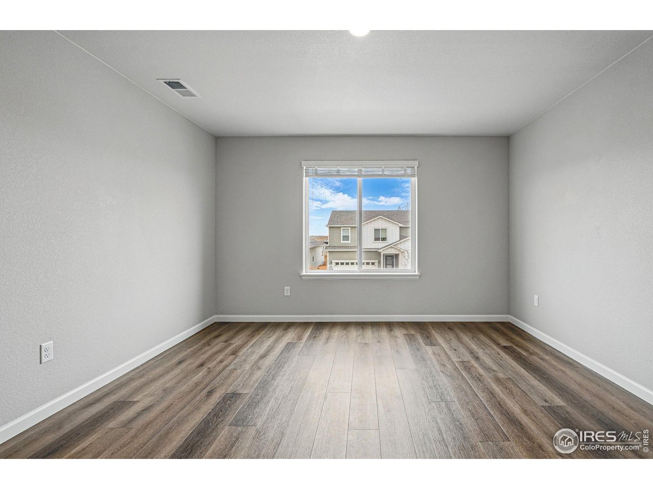 2310 Angus Street Mead, CO 80542 - Photo 19 of 39 a view of an empty room and window