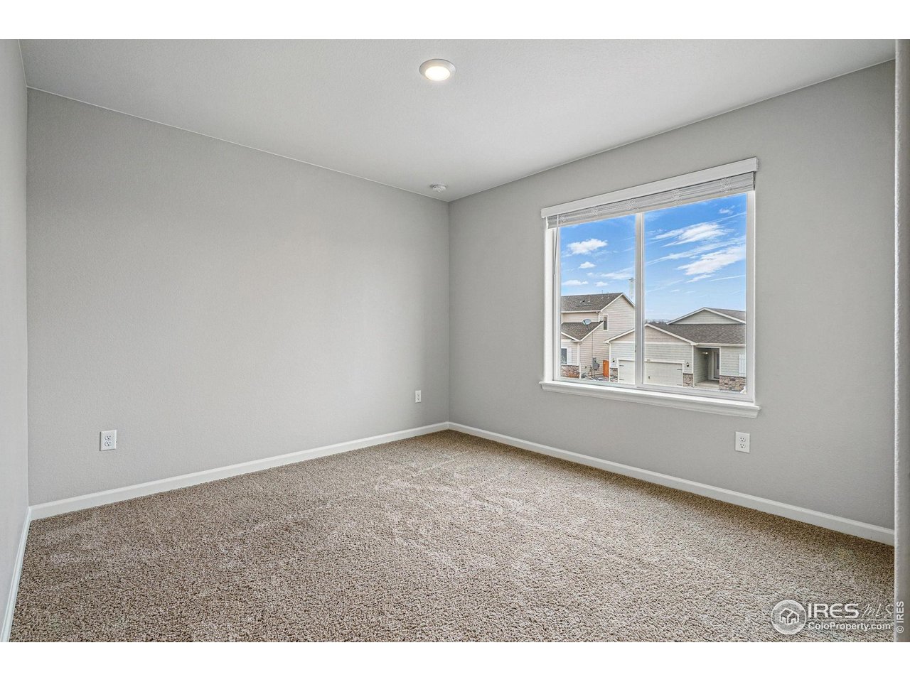 2310 Angus Street Mead, CO 80542 - Photo 26 of 39 a view of an empty room with a window