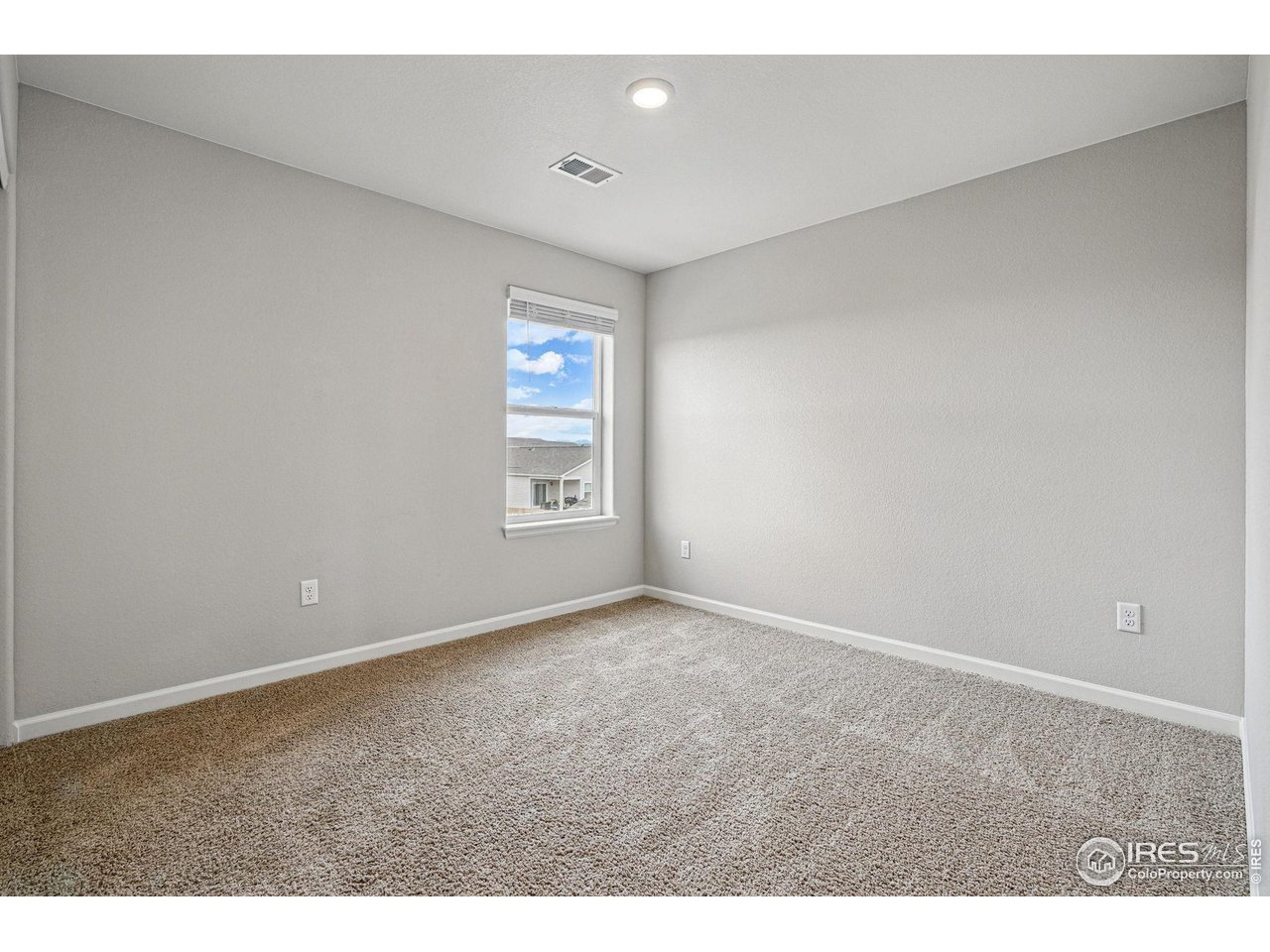 2310 Angus Street Mead, CO 80542 - Photo 28 of 39 a view of an empty room and window