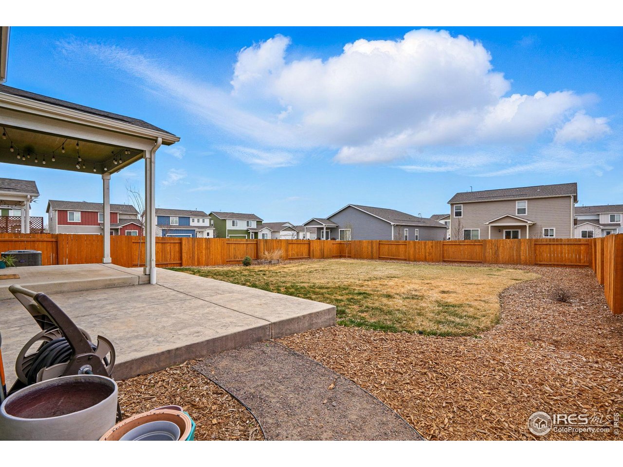 2310 Angus Street Mead, CO 80542 - Photo 32 of 39 a view of swimming pool with outdoor seating