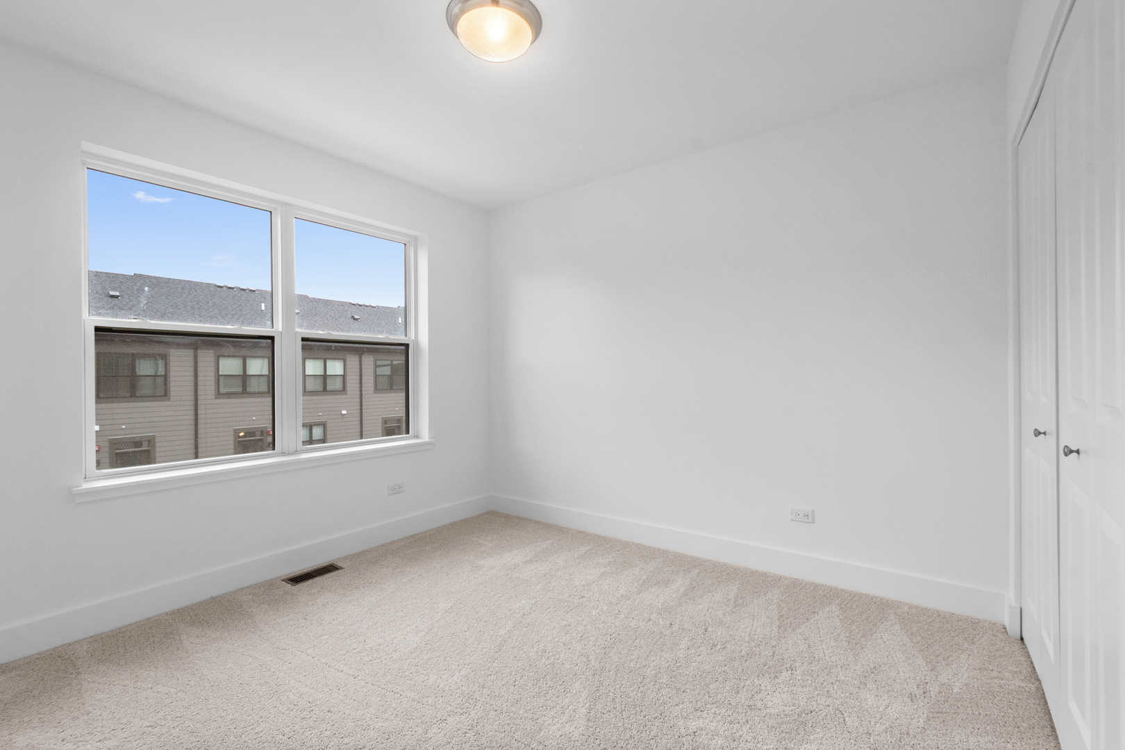 8375 Mulberry Avenue Morton Grove, IL 60053 - Photo 14 of 24 an empty room with a window