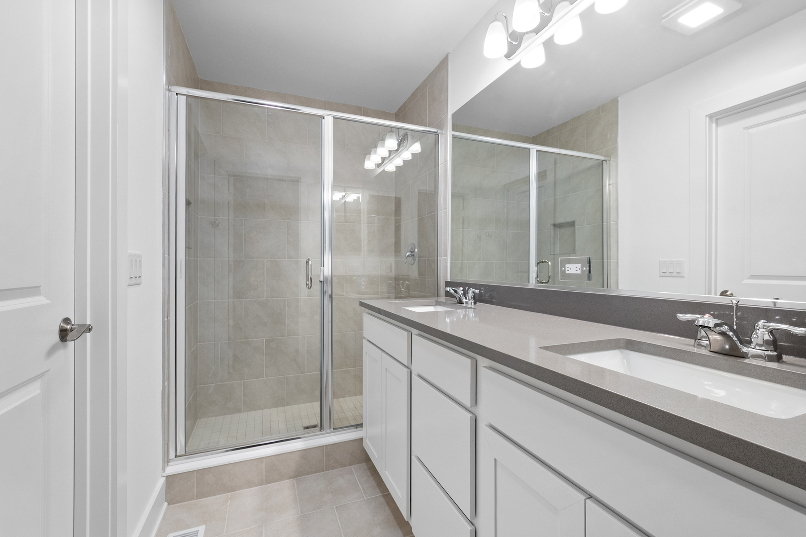 8375 Mulberry Avenue Morton Grove, IL 60053 - Photo 19 of 24 a bathroom with a double vanity sink mirror and shower
