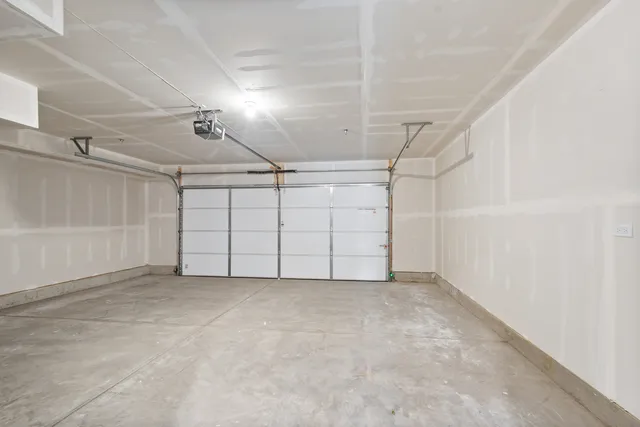 a view of a brick house with many windows