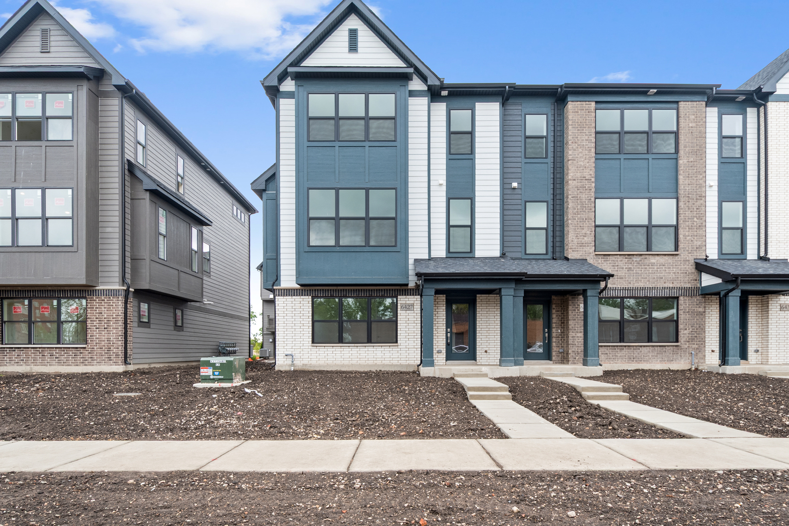 8375 Mulberry Avenue Morton Grove, IL 60053 - Photo 23 of 24 a front view of a house with a yard