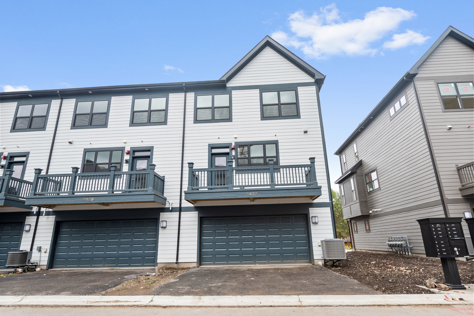 8375 Mulberry Avenue Morton Grove, IL 60053 - Photo 24 of 24 a view of residential houses with wooden walls and stairs