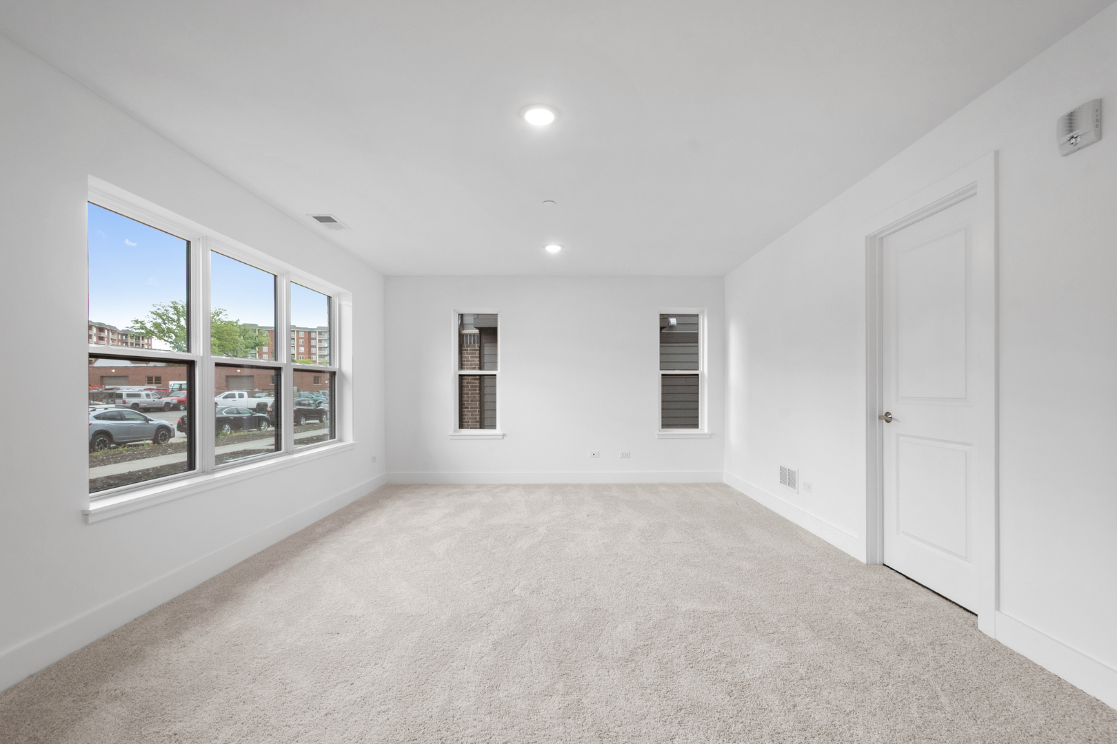 8375 Mulberry Avenue Morton Grove, IL 60053 - Photo 3 of 24 a view of an empty room with a window