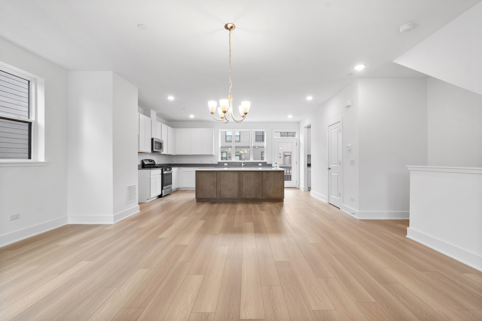 8375 Mulberry Avenue Morton Grove, IL 60053 - Photo 7 of 24 a view of kitchen with wooden floor and window