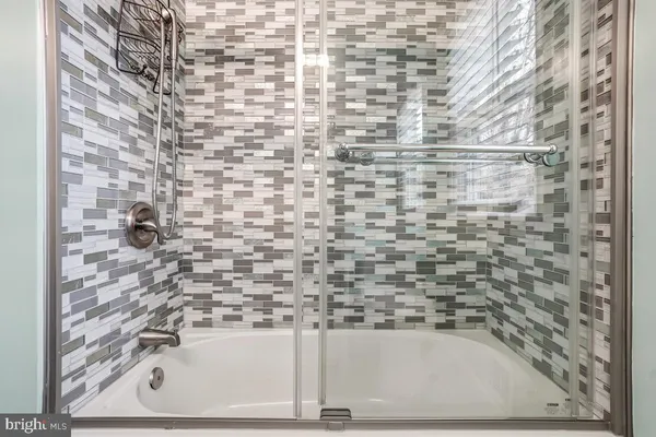 a bathroom with a bathtub