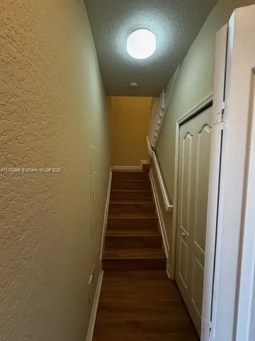 a view of hallway with stairs