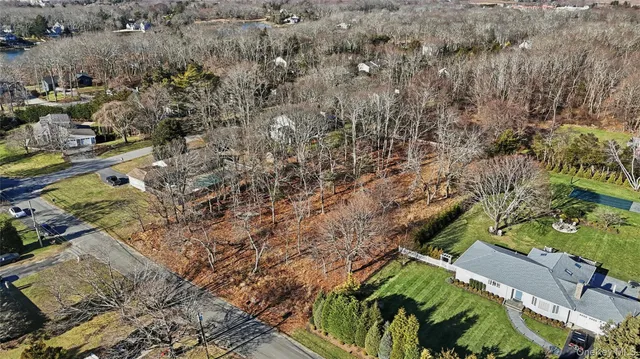 a view of a balcony with a small yard