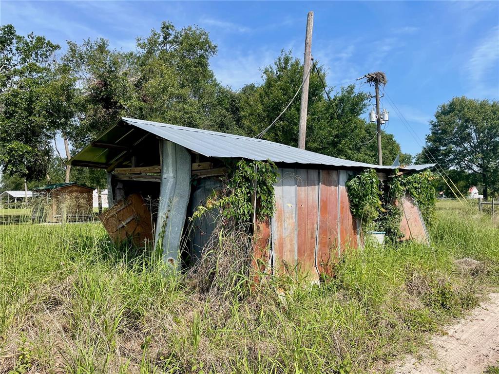 Undisclosed Address Lithia, FL 33547 - Photo 15 of 18 a backyard of a house with lots of green space