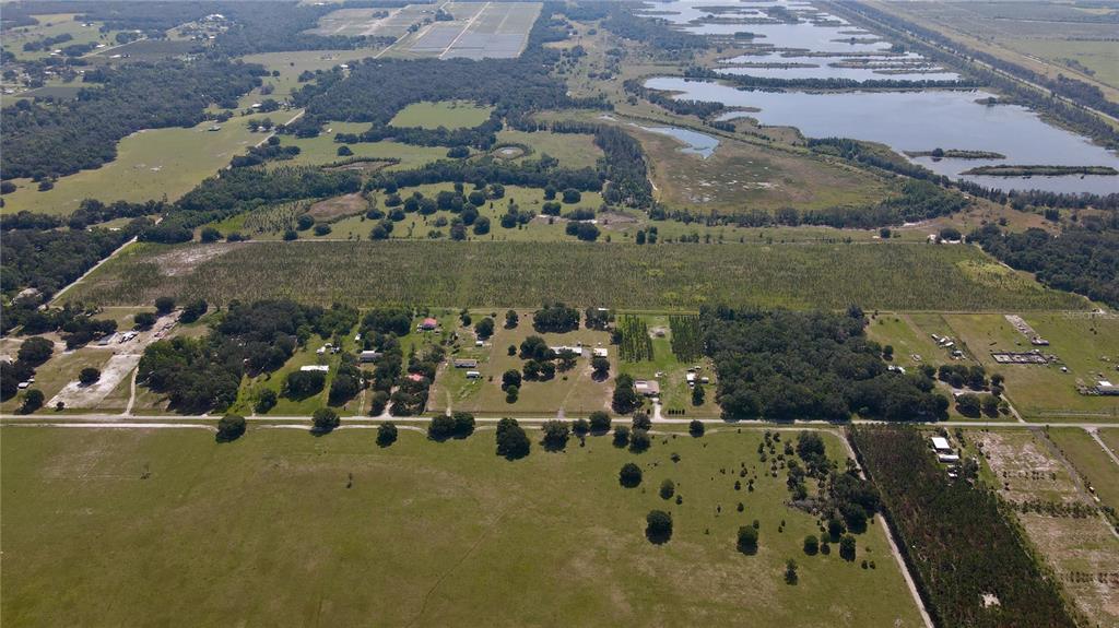 Undisclosed Address Lithia, FL 33547 - Photo 10 of 18 an aerial view of a house with a yard