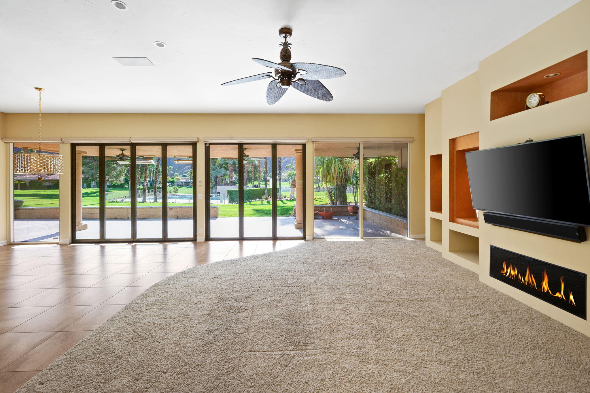 77675 Seminole Road Indian Wells, CA 92210 - Photo 4 of 40 a view of an room with a flat screen tv