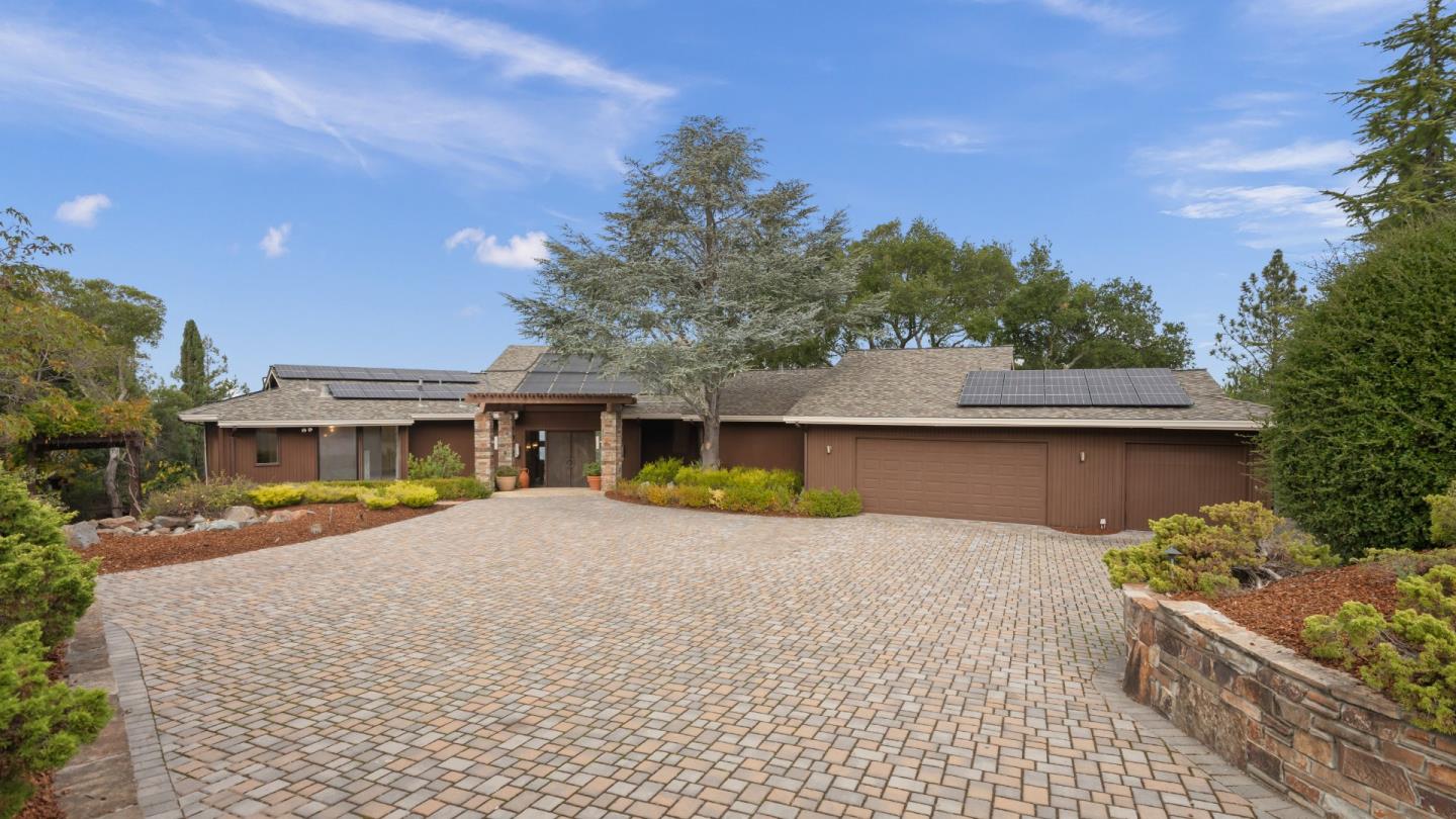 16353 Aztec Ridge Drive Los Gatos, CA 95030 - Photo 4 of 61 a house view with a garden space