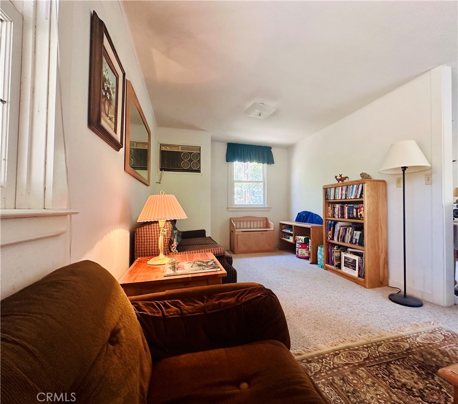 39550 Saunders Bass Lake, CA 93604 - Photo 13 of 30 a bedroom with furniture and a large window