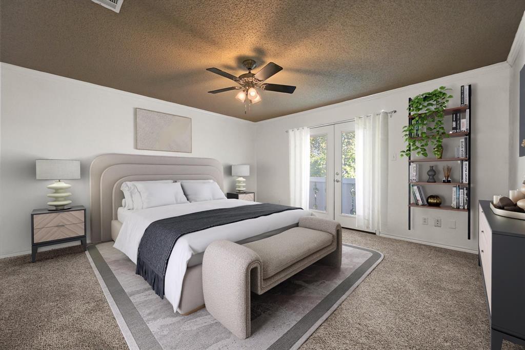 2312 Perkins Road Arlington, TX 76016 - Photo 20 of 37 a bedroom with a large bed and a chandelier fan