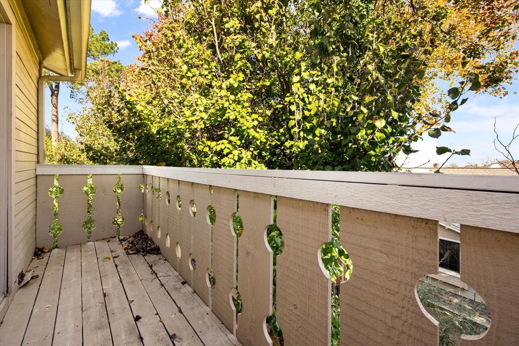 2312 Perkins Road Arlington, TX 76016 - Photo 25 of 37 a view of a balcony with wooden floor and fence