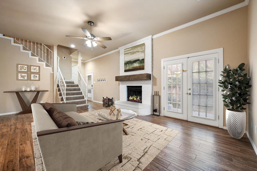 2312 Perkins Road Arlington, TX 76016 - Photo 5 of 37 a living room with furniture a large window and red walls