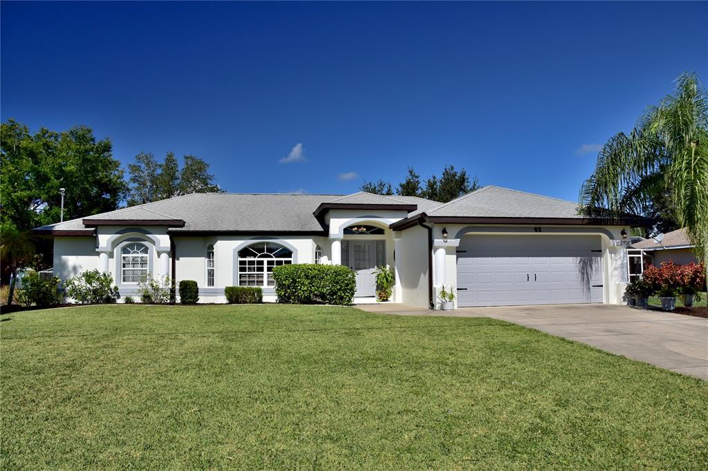 65 Marker Road Rotonda West, FL 33947 - Photo 1 of 1 a view of a house with a yard