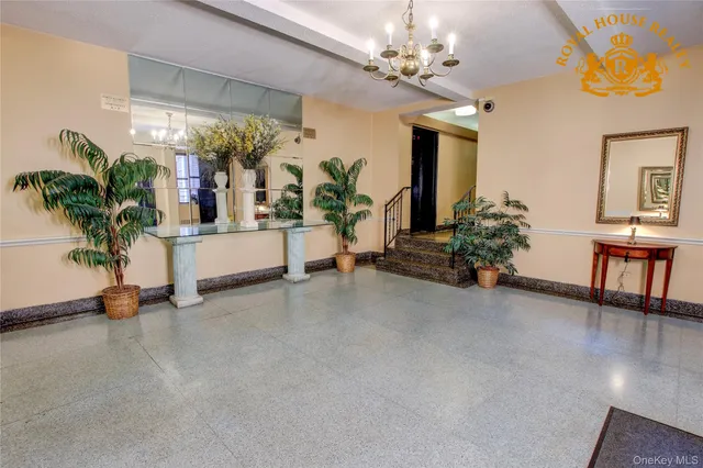 a view of livingroom with furniture and a chandelier