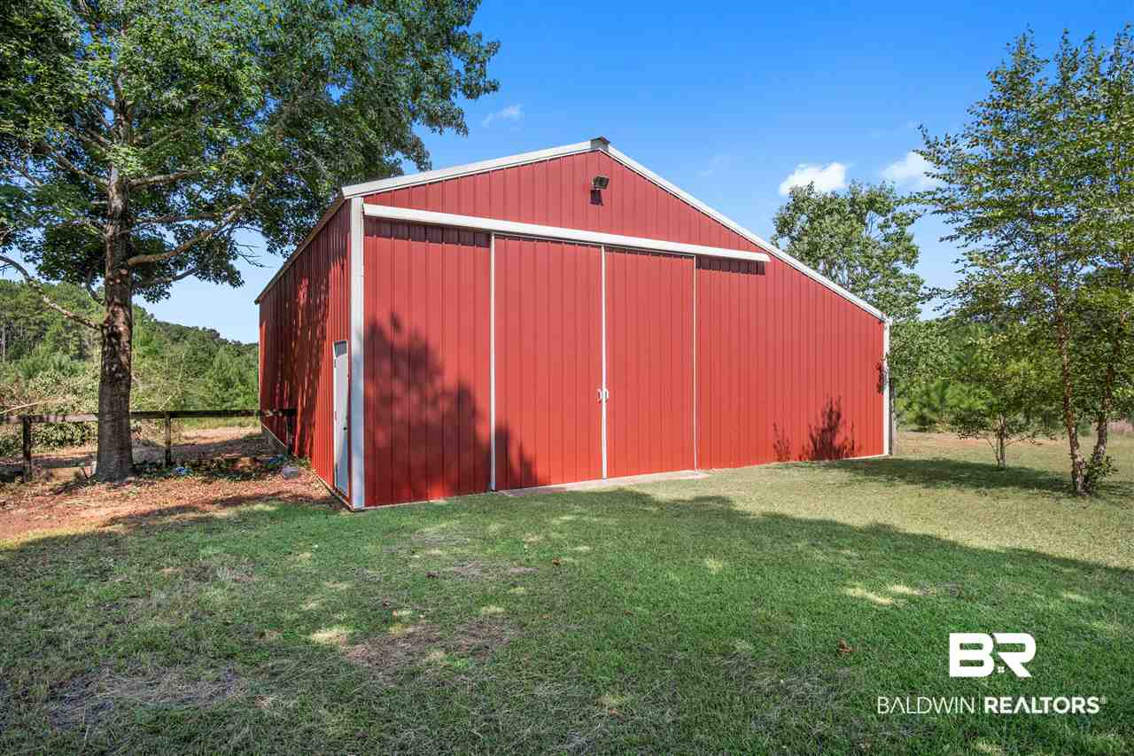7785 Cuss Fork Road Wilmer, AL 36587 - Photo 33 of 38 36ft x 50ft Shop with pull through doors and slab