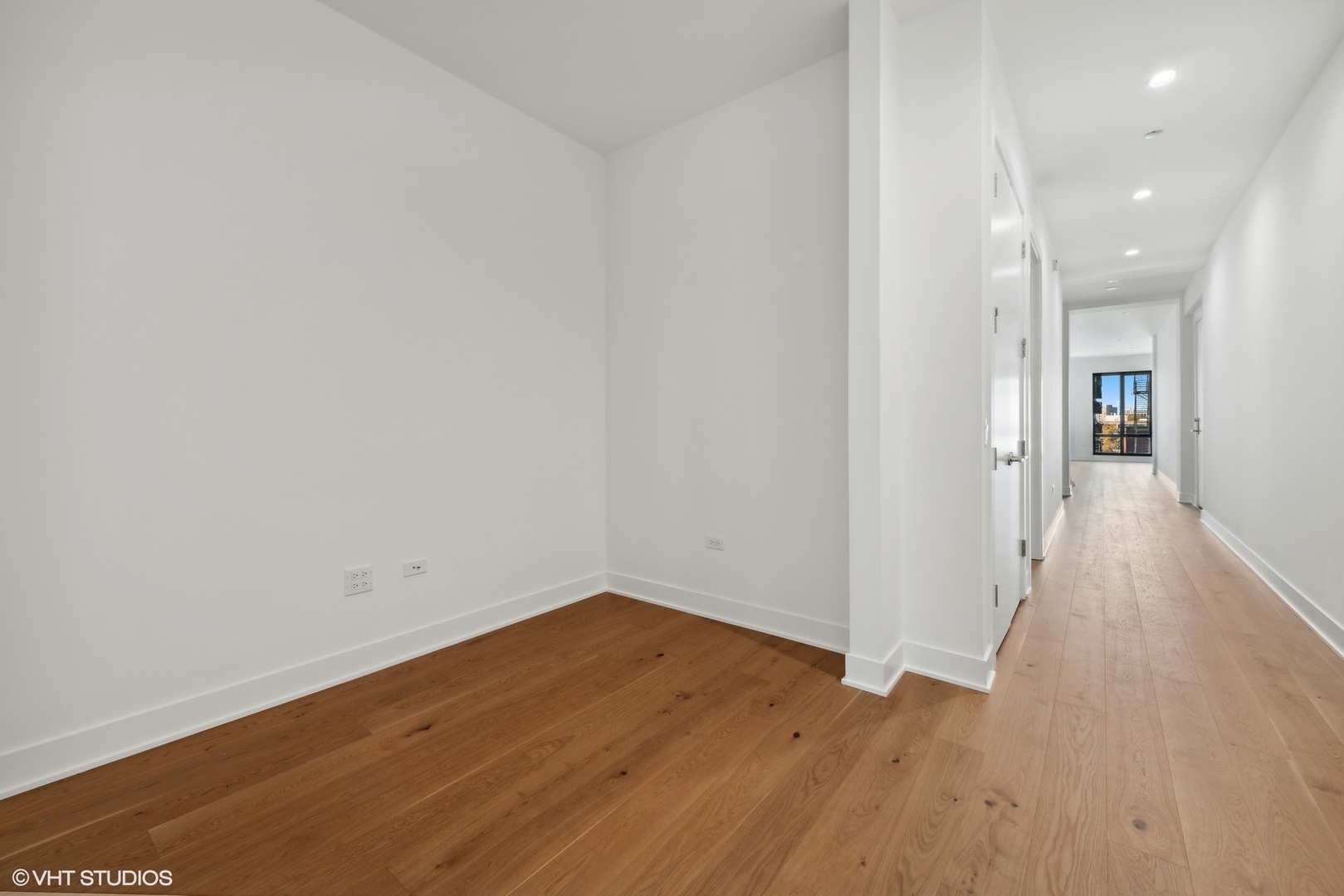 323 South Racine Avenue, Unit 6B Chicago, IL 60607 - Photo 32 of 36 a view of a room with wooden floor