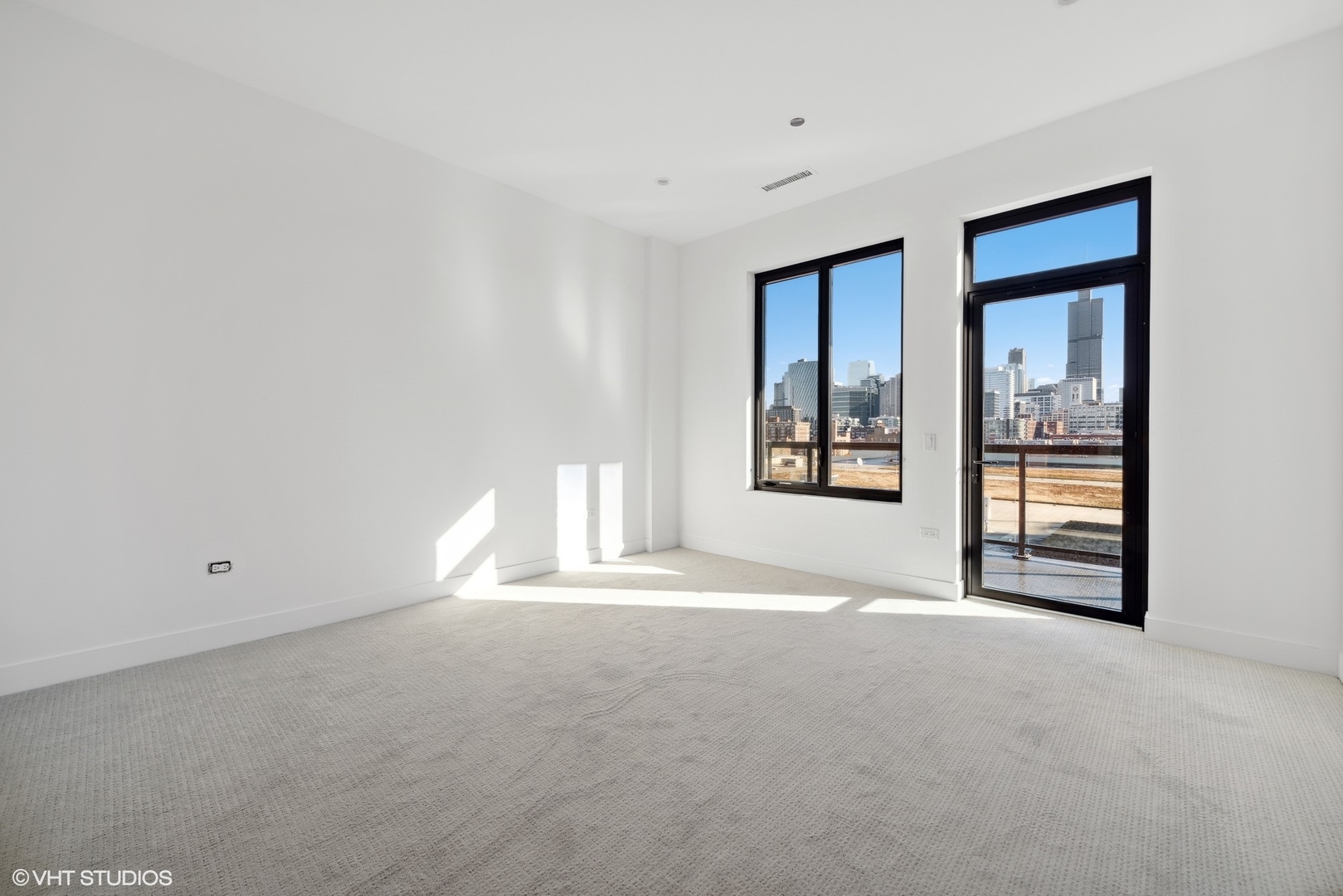323 South Racine Avenue, Unit 6B Chicago, IL 60607 - Photo 33 of 36 a view of an empty room with a window