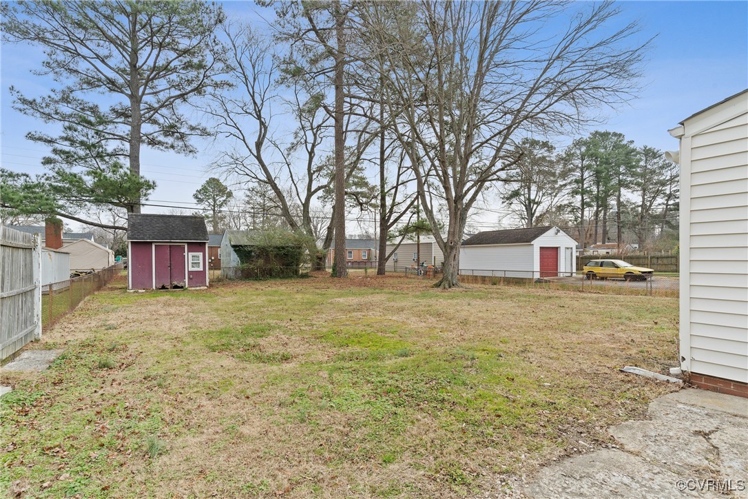 404 Beulah Road Sandston, VA 23150 - Photo 16 of 19 View of yard featuring a storage shed