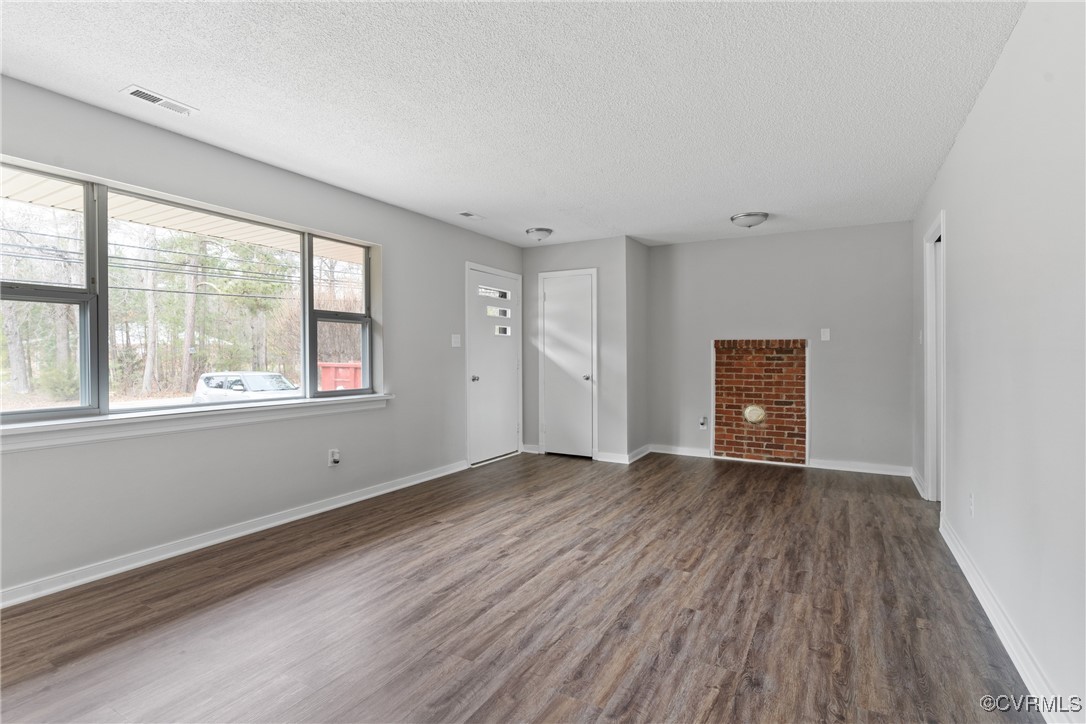 404 Beulah Road Sandston, VA 23150 - Photo 2 of 19 Living Room, Could add Wood Burning stove. LVP flo