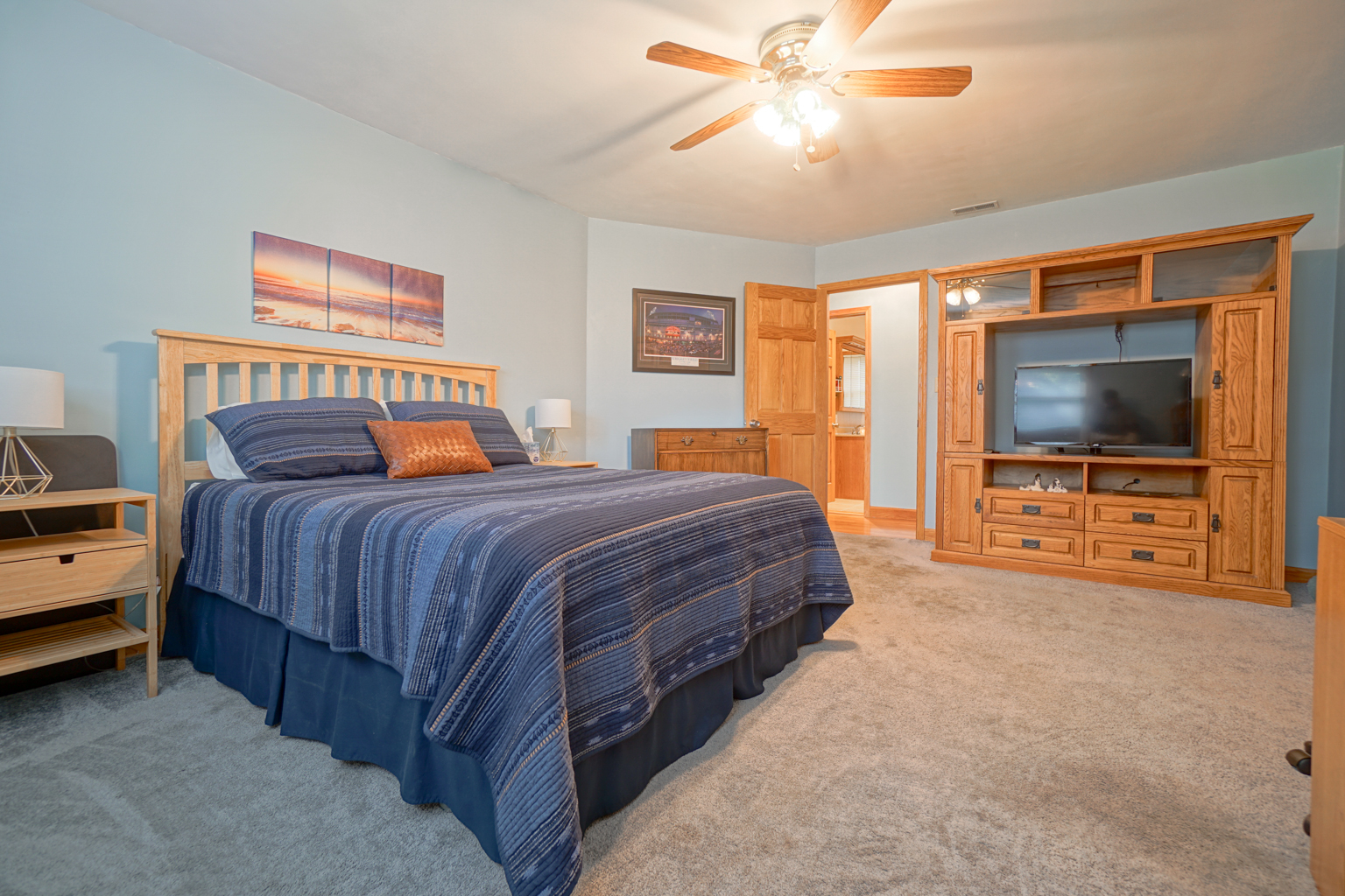 205 South Elmhurst Road Prospect Heights, IL 60070 - Photo 14 of 24 a bedroom with a bed and a flat screen tv