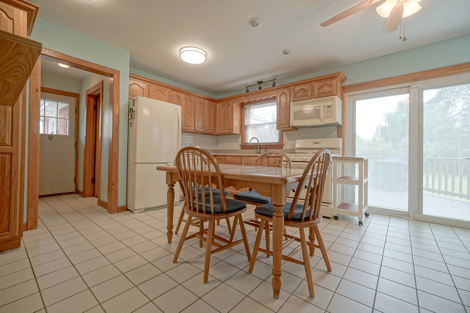 205 South Elmhurst Road Prospect Heights, IL 60070 - Photo 8 of 24 a view of a dining room with furniture