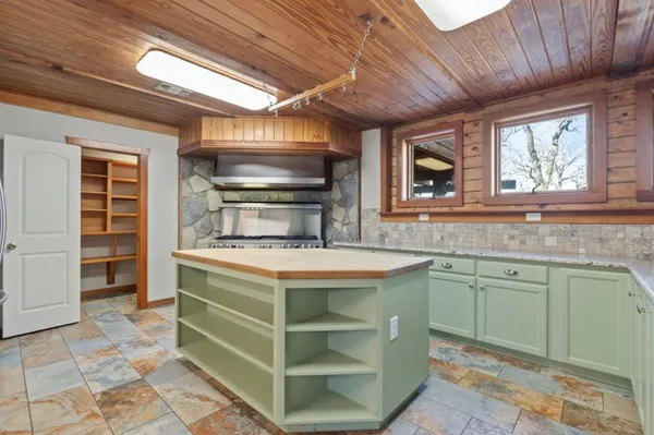 a view of cabinets and window