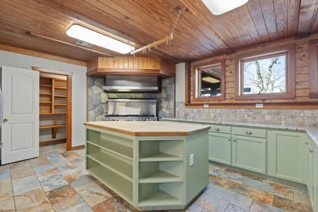 a view of cabinets and window