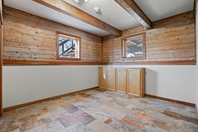 a view of a door and a window