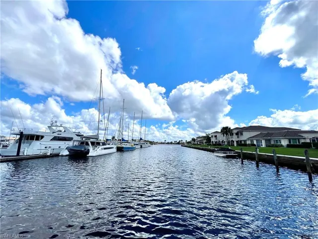 a view of pool yard and lake view