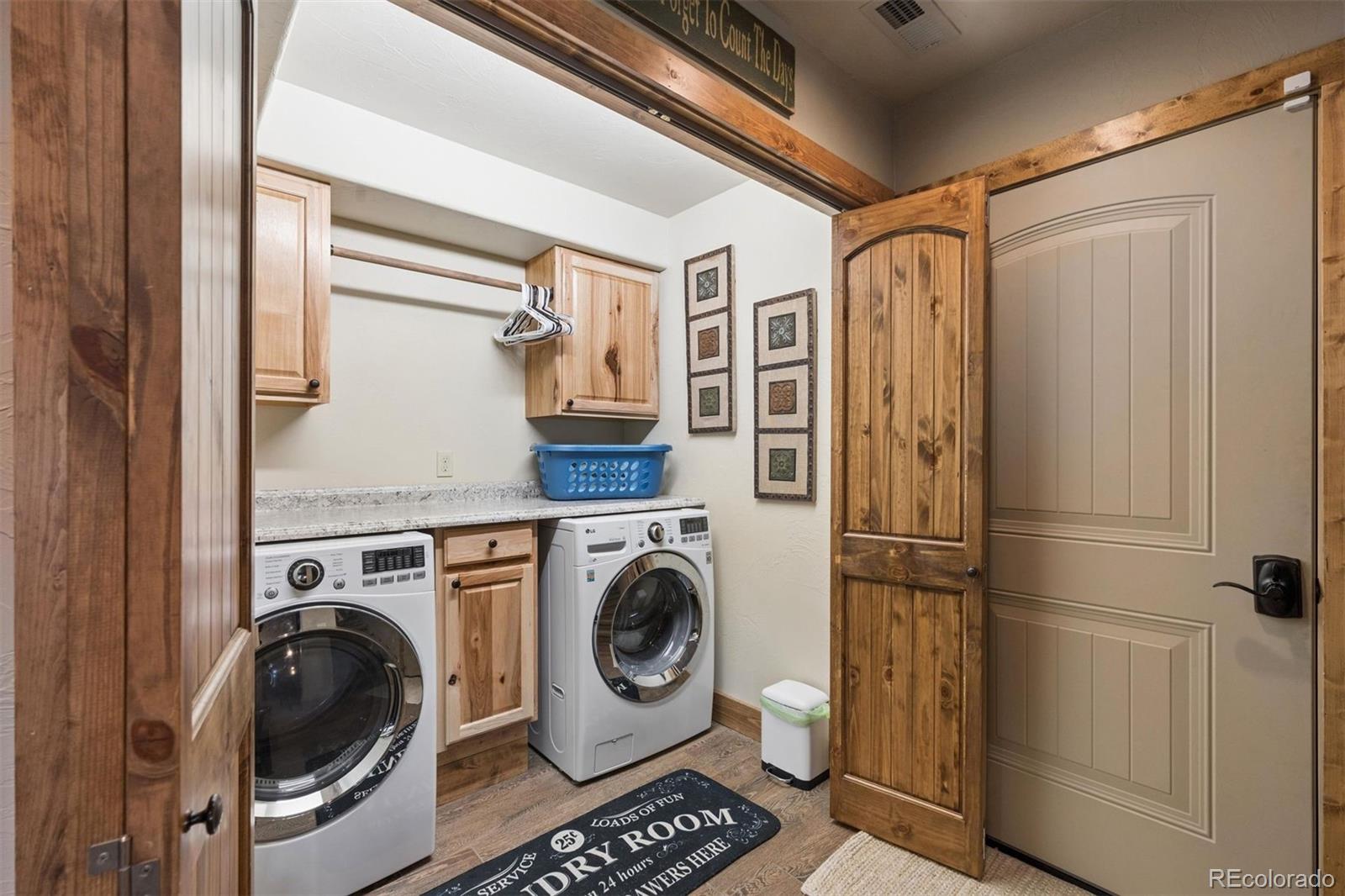 2894 County Road 43 Bailey, CO 80421 - Photo 23 of 40 a utility room with dryer and washer