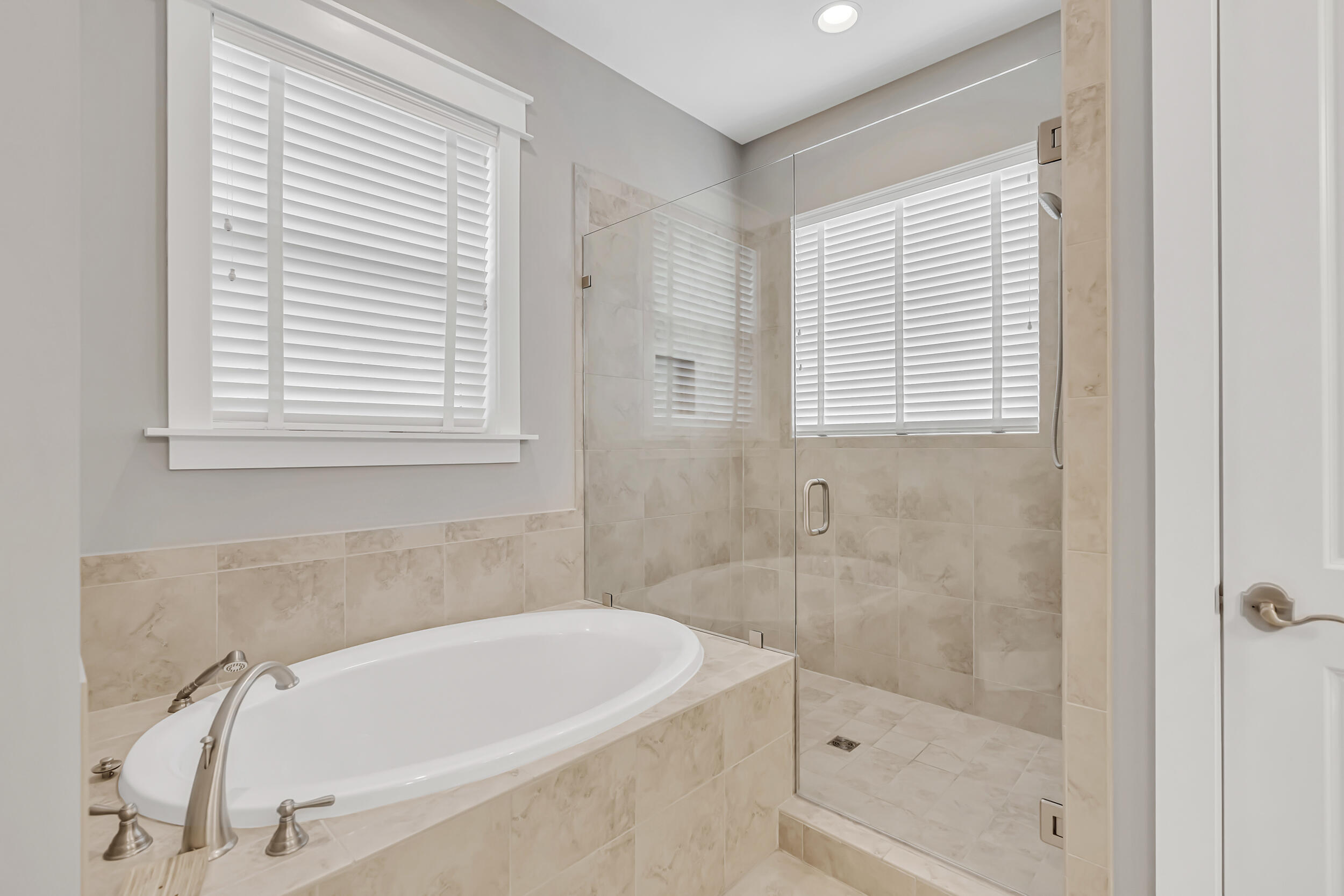 679 Flatwoods Forest Loop Santa Rosa Beach, FL 32459 - Photo 19 of 46 a white bath tub sitting next to a shower