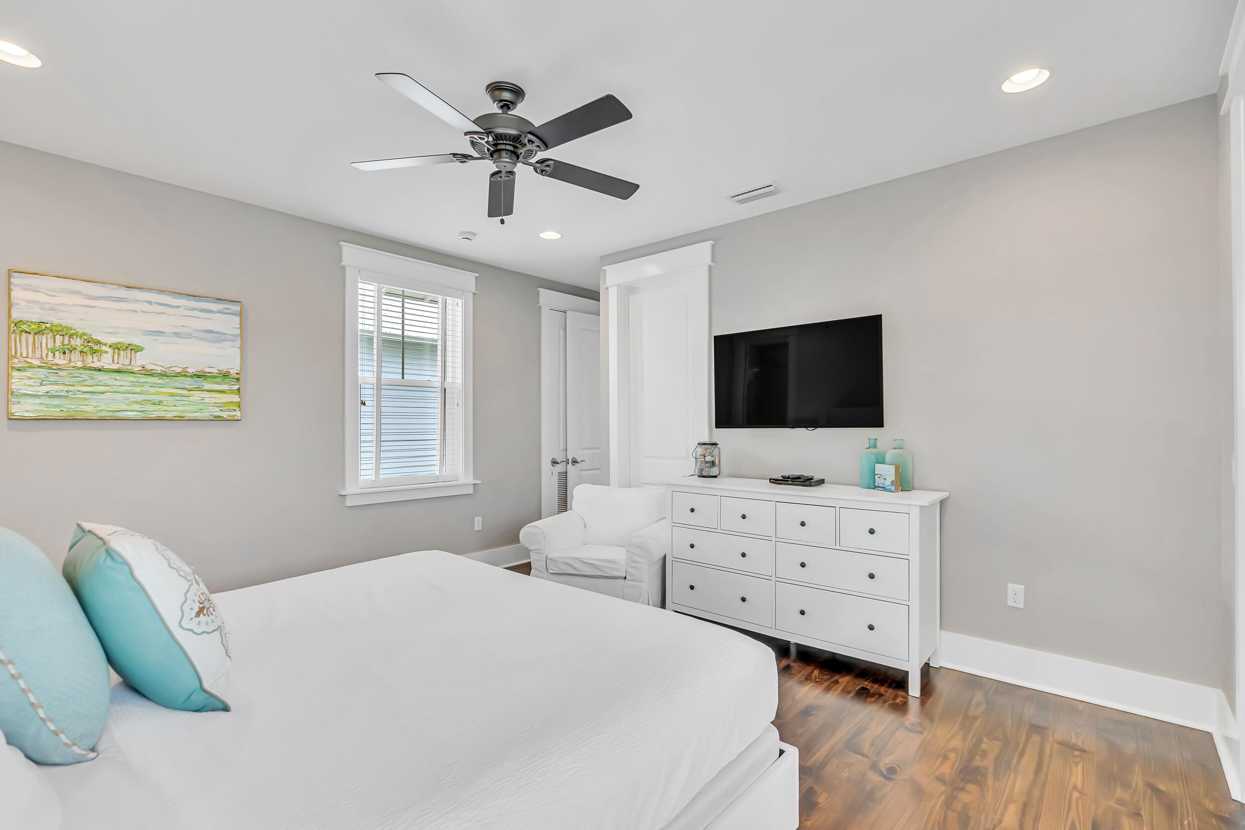 679 Flatwoods Forest Loop Santa Rosa Beach, FL 32459 - Photo 23 of 46 a living room with furniture and a flat screen tv